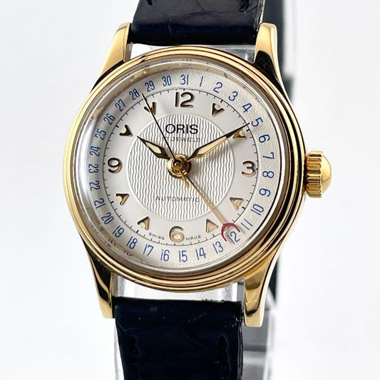 ORIS 574 女士腕表 — 自动上链，金色表盘，不锈钢